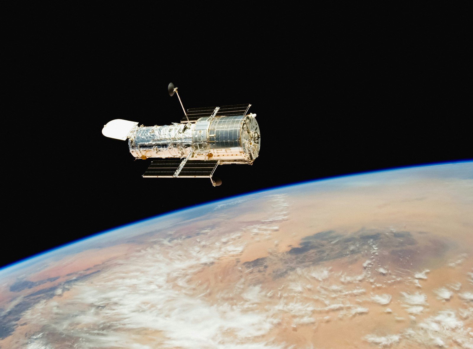 Satellite orbiting Earth for remote sensing and monitoring